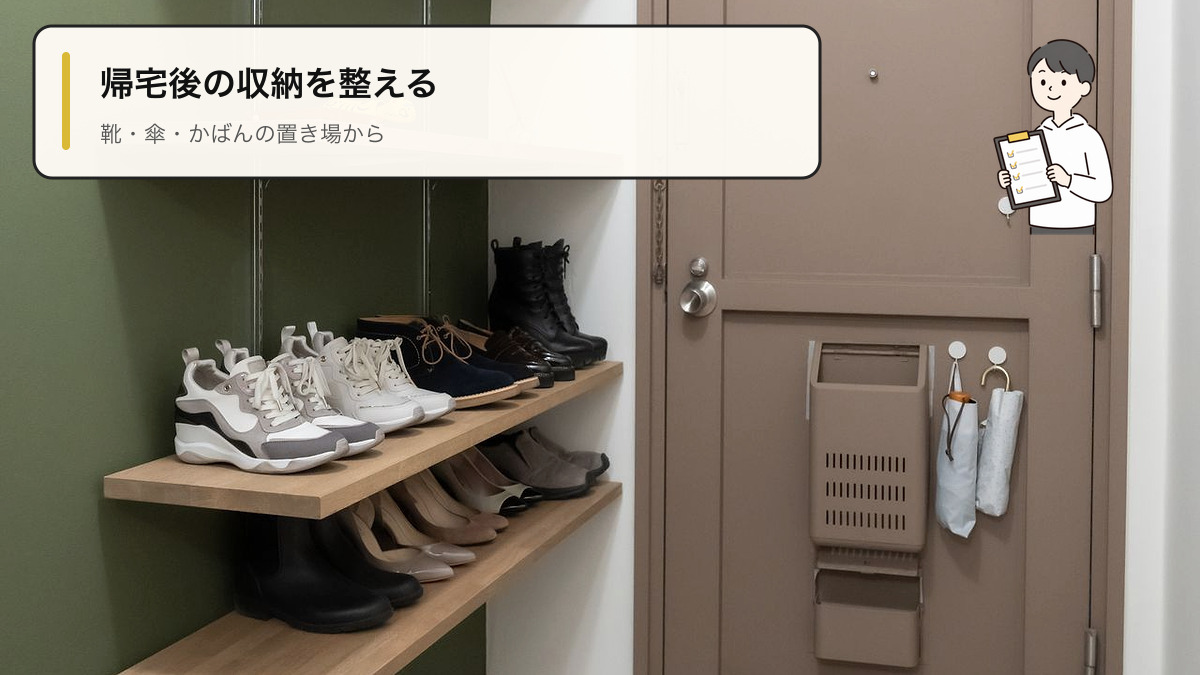 施工事例フウフとネコの家の玄関に設けた木の可動棚と緑色の壁